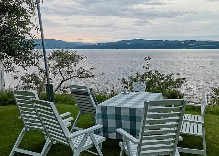 Peaceful Log By The Fjord On *