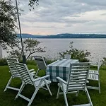 Peaceful Log By The Fjord On *